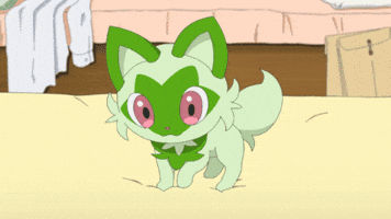 Gif of a Sprigatito (pokemon) making biscuits on blanket.